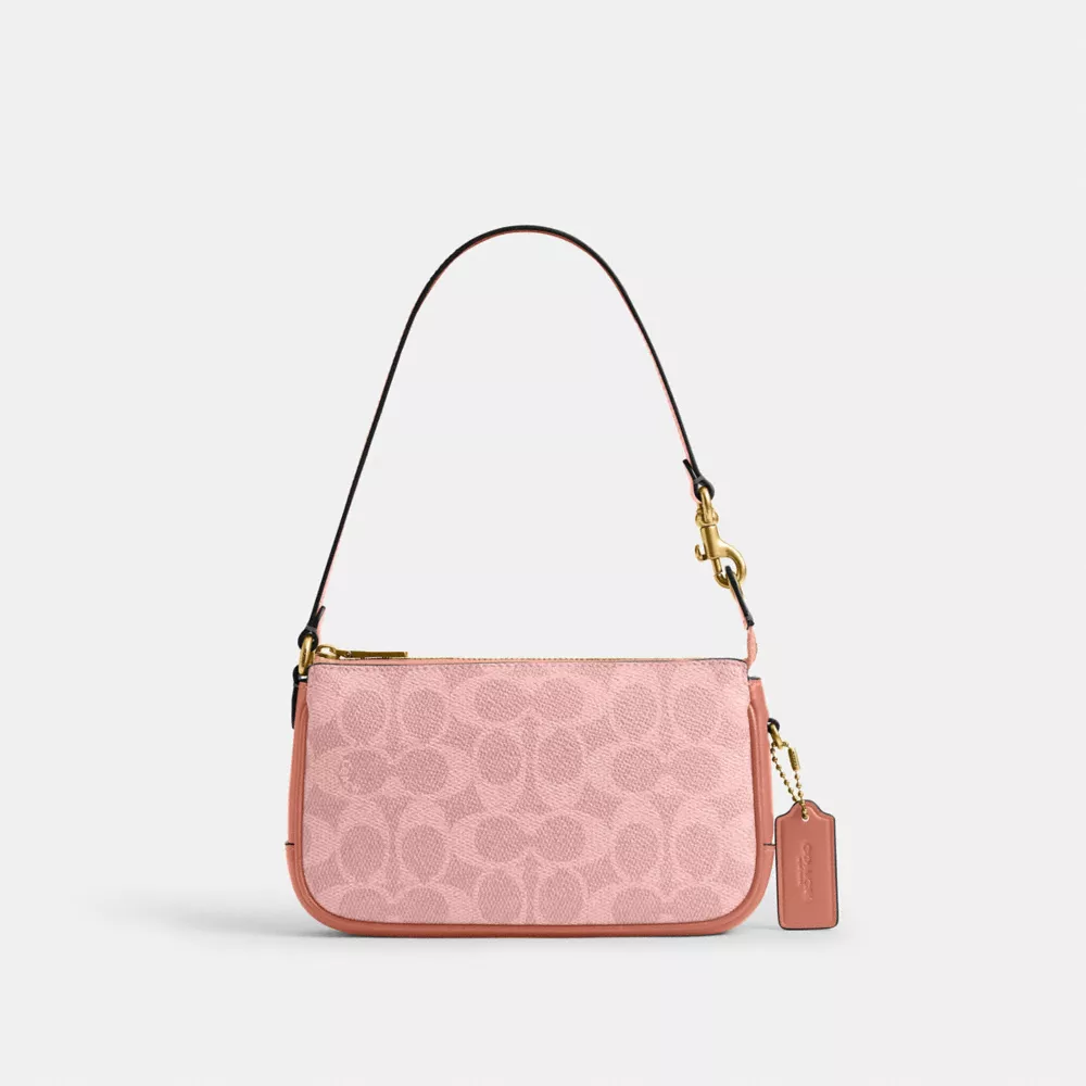 A stylish pink handbag with a crossbody strap and a gold zipper.