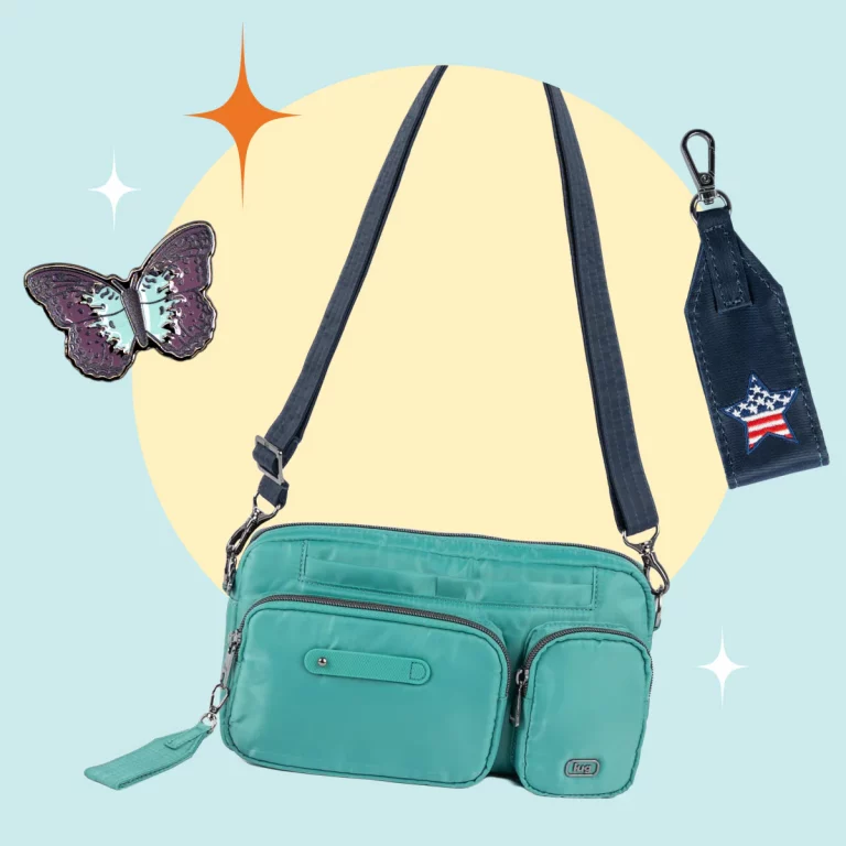 A teal crossbody bag featuring multiple pockets, accompanied by a butterfly pin and a tag with a star design.